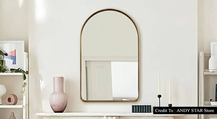 gold arched mirror
